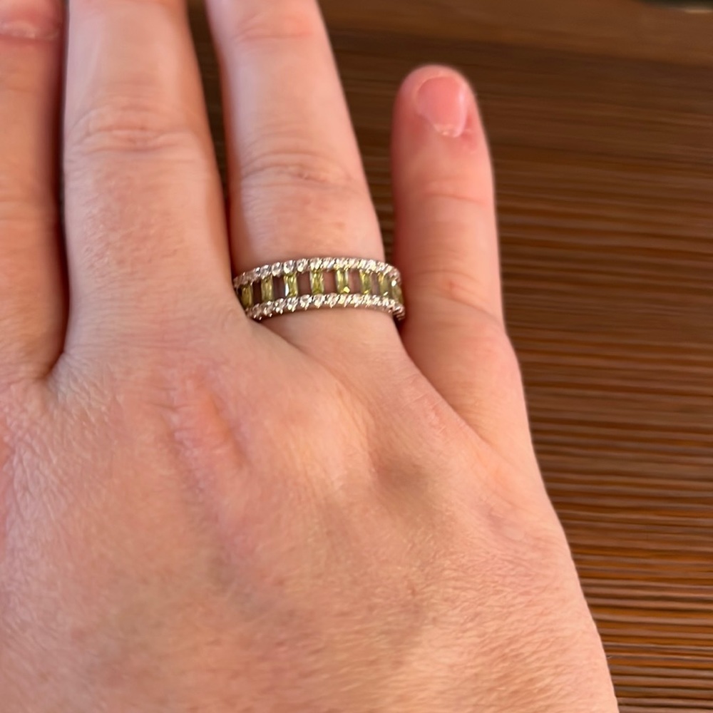 Gorgeous light peridot band with cubic zirconia accents